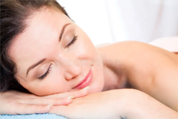 woman having a sports massage at home